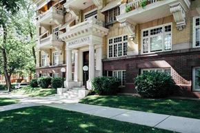 Salt Lake City apartment for rent - an apartment building with a sidewalk and lawn in front of it