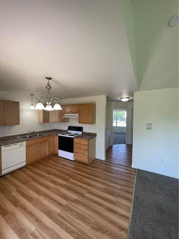 Weston apartment for rent - an empty kitchen with wood flooring in an empty house