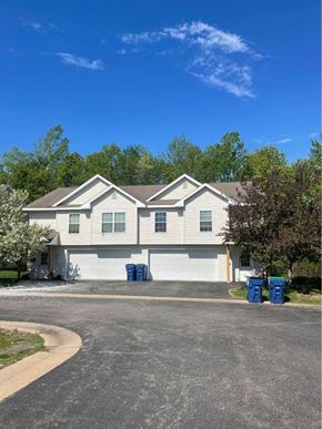 Weston apartment for rent - a white house with a street in front of it