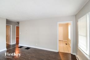 Decatur house for rent - A room with a FirstKey Homes logo on the floor.