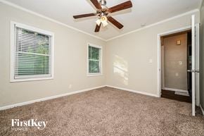 Decatur house for rent - the master bedroom has a ceiling fan and a door to the closet
