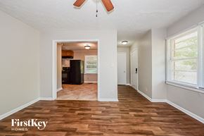 Forest Park house for rent - a living room with a hard wood floor and a large window