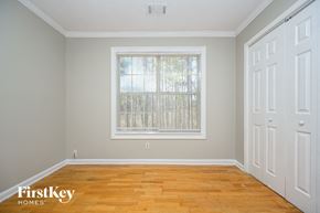 Rex house for rent - the second bedroom has a large window and hardwood floors