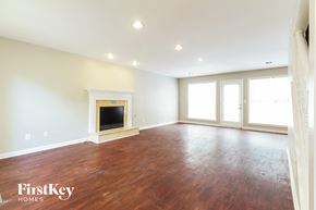 Mcdonough house for rent - a living room with wood flooring and a fireplace