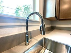 Forest Grove house for rent - A kitchen sink with a chrome faucet.