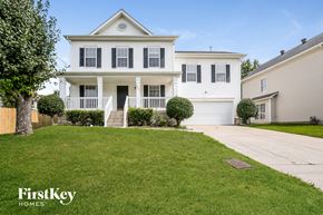 Antioch house for rent - a white house with black shutters and a lawn
