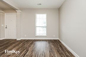 Antioch house for rent - the spacious living room with hardwood flooring and a window