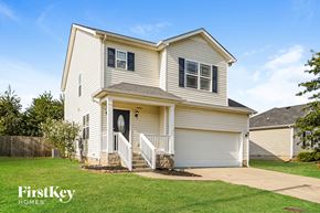Clarksville house for rent - A two-story house with a garage is for sale by FirstKey Homes.