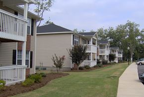 Macon apartment for rent - a row of condominiums on the side of a sidewalk