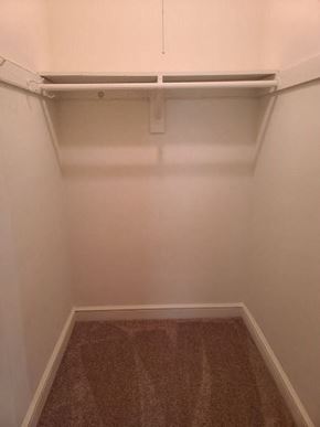 Washington apartment for rent - A small, empty room with a carpeted floor and a white wall.