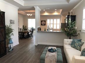 New Port Richey apartment for rent - a living room and kitchen with a couch and a table