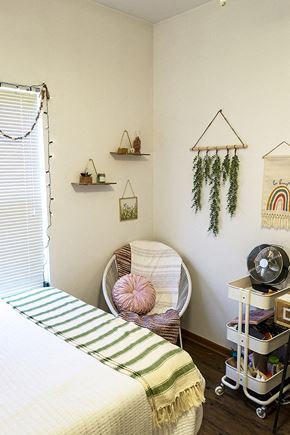 Ames apartment for rent - a bedroom with a bed and a chair in it