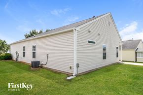 Winsten-Salem house for rent - the outside of a white house with a grassy yard