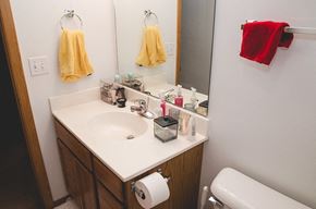 Ames apartment for rent - a bathroom with a sink and a mirror
