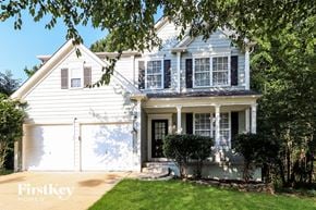 Acworth house for rent - A white house with a black door and windows.