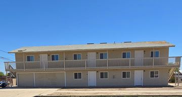 El Centro apartment for rent - A two-story building with a balcony on the second floor.