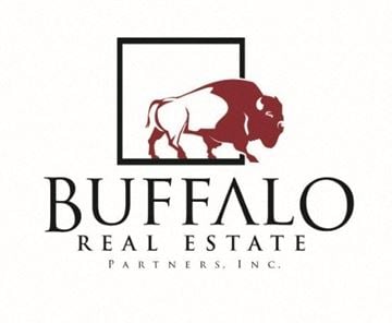 Houston apartment for rent - a logo with a picture of a bull