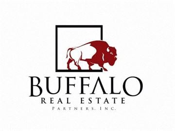 Houston apartment for rent - a logo with a bull in a frame