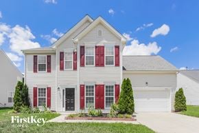 Charlotte house for rent - a white house with red shutters and red doors