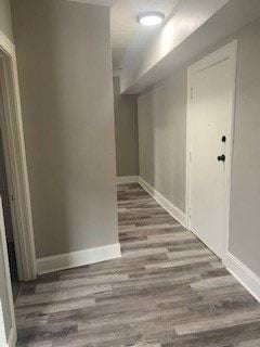 Cleveland apartment for rent - A long hallway with a grey floor and white walls.