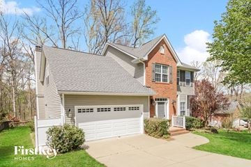 Greensboro house for rent - a home with a white garage door
