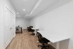 Philadelphia apartment for rent - a room with desks and chairs and a door