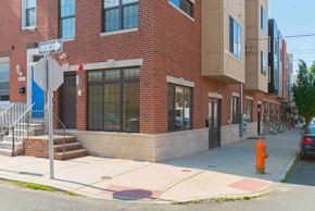 Philadelphia apartment for rent - a building on the corner of a street with a fire hydrant