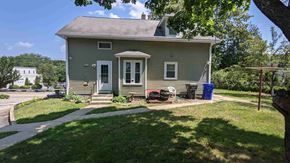 West Warwick apartment for rent - a small house with a lawn and a driveway