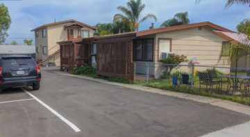 El Cajon apartment for rent - a house with a car parked in front of it