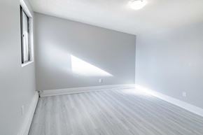 Niagara Falls apartment for rent - an empty room with white walls and a window