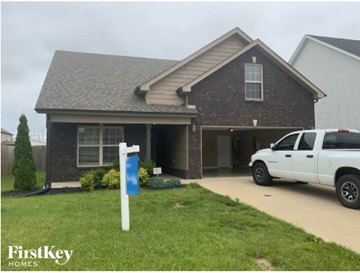Clarksville house for rent - A house with a white pickup truck parked in front.