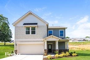 Winston Salem house for rent - A house with a blue stripe on the side and a garage door.