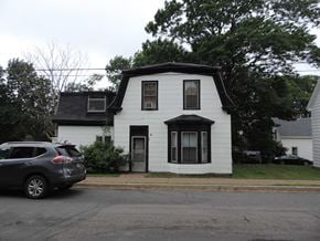 New Glasgow apartment for rent - a white house with a car parked in front of it