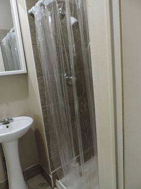 New Glasgow apartment for rent - a small bathroom with a shower and a sink