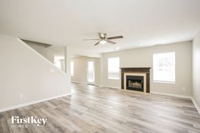 Noblesville house for rent - the living room has a fireplace and hardwood floors
