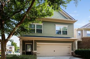 Woodstock house for rent - A two-story house with a garage is for sale.