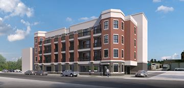 Red Bank apartment for rent - a rendering of a brick and white building on a city street