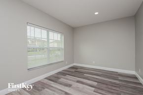 Davenport house for rent - the living room of a new home with wood flooring and a large window