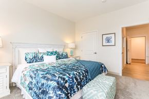 Wareham apartment for rent - a bedroom with a bed and a door to a bathroom