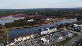 Wareham apartment for rent - an aerial view of a city with a lake and buildings