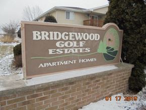 Neenah apartment for rent - a sign for the bridgewood golf estates apartment homes