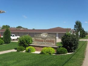 Neenah apartment for rent - a sign yards in front of a building