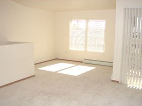 Neenah apartment for rent - an empty room with a window and a radiator