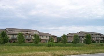 Denmark apartment for rent - A row of houses with grass in front.