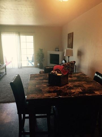 Green Bay apartment for rent - a living room with a dining room table and a couch