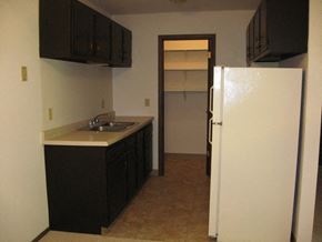South Milwaukee apartment for rent - a kitchen with a sink and a refrigerator