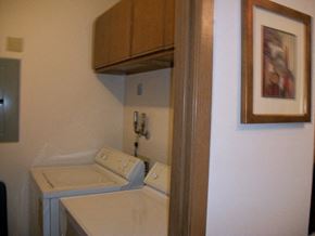 West Bend apartment for rent - a small bathroom with a toilet and a cabinet