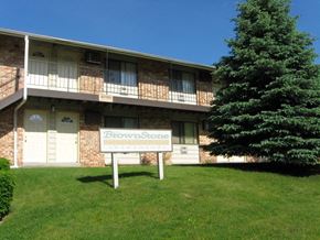 St. Francis apartment for rent - an apartment building with a sign in front of it