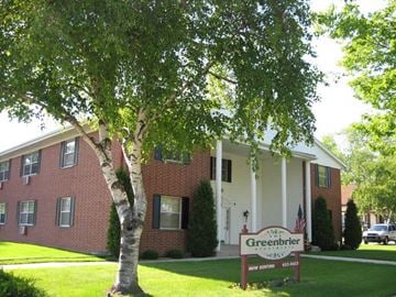 Sheboygan apartment for rent - an apartment building with a greenfield center sign
