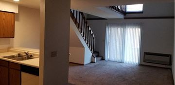 Milwaukee apartment for rent - a kitchen with a sink and a staircase in a house